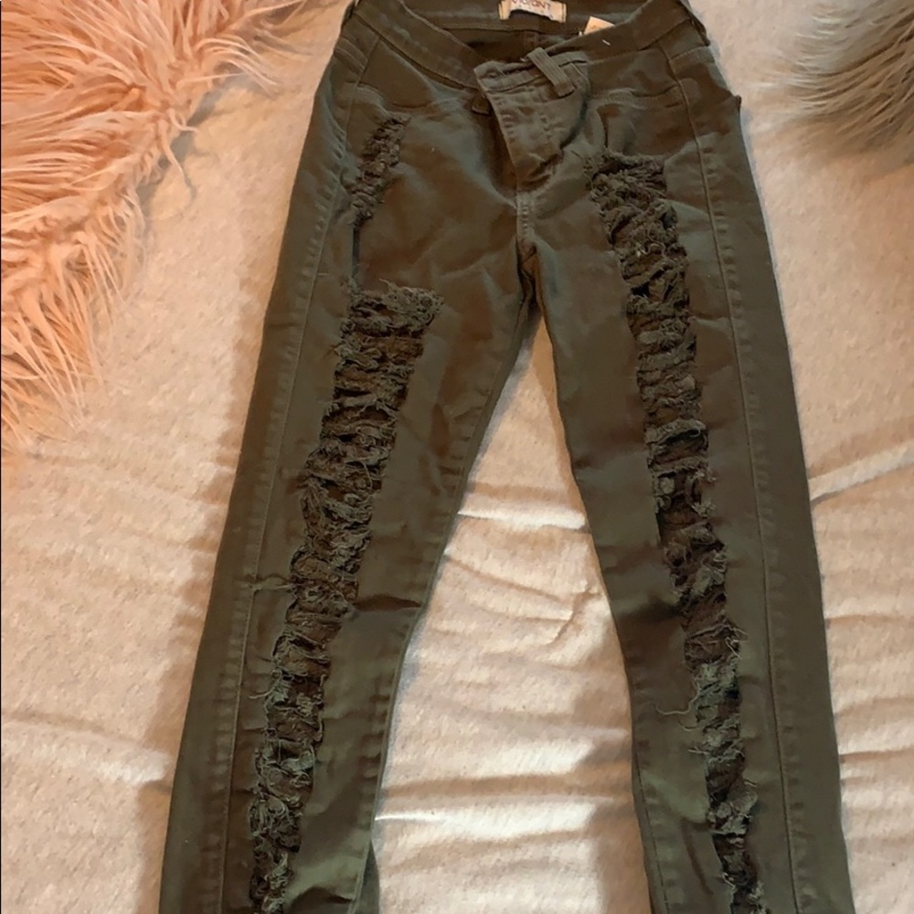 Olive green distressed jeans